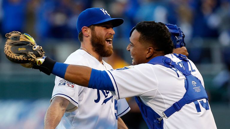 KANSAS CITY, MO - OCTOBER 15:  Greg Holland #56 and Salvador Perez #13 of the Kansas City Royals celebrates their 2 to 1 win over the Baltimore Orioles to 