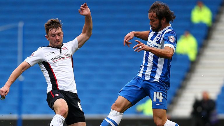 Lee Frecklington of Rotherham challenges with Brighton's Inigo Calderon