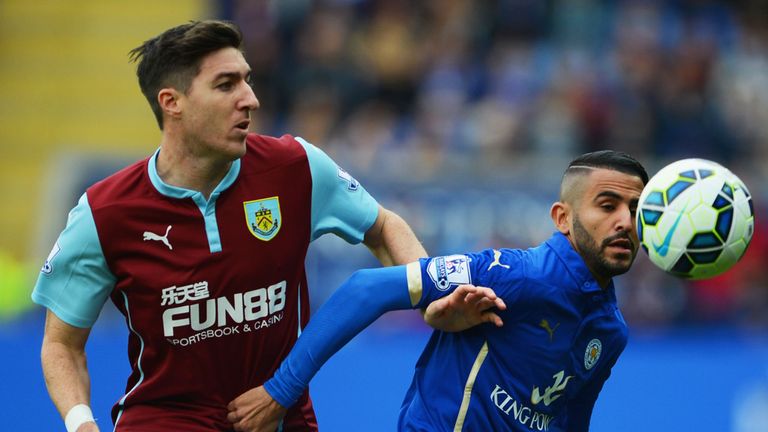 Stephen Ward and Riyad Mahrez keep their eyes on the ball