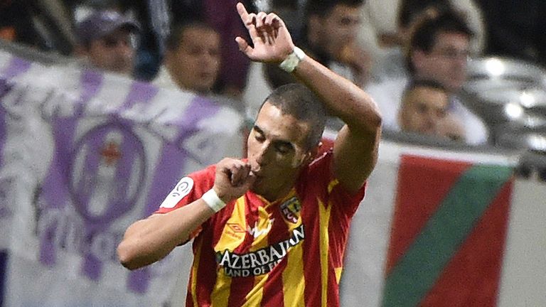 Lens' midfielder Alharbi El Jadeyaoui celebrates after scoring