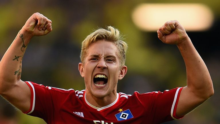 DORTMUND, GERMANY - OCTOBER 04:  Lewis Holtby of Hamburger SV celebrates victory after the Bundesliga match between Borussia Dortmund and Hamburger SV at 