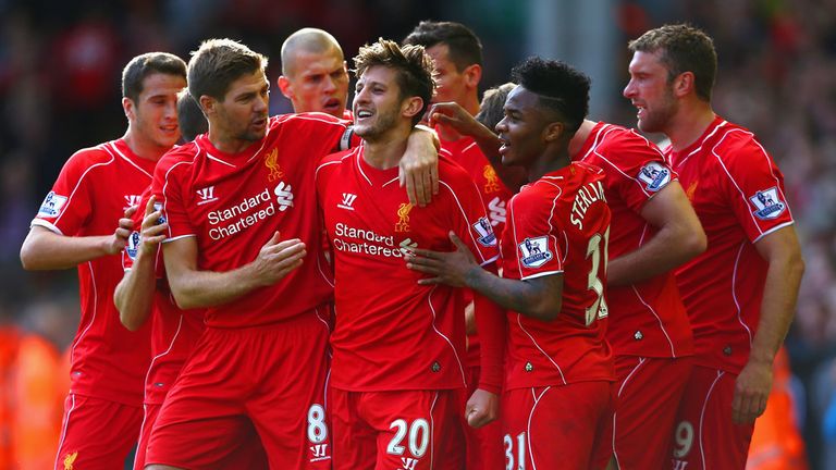Adam Lallana celebrates after giving Liverpool the lead
