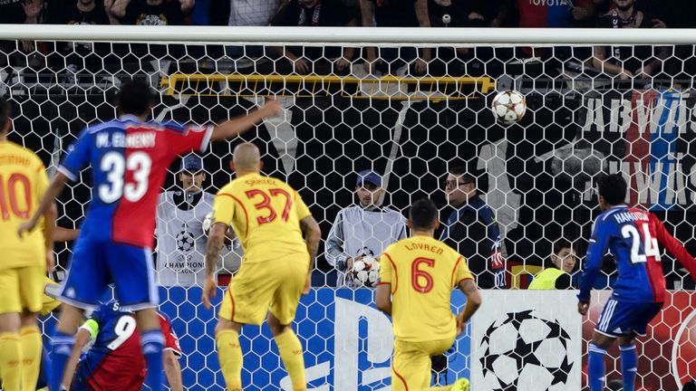 Basel captain Marco Streller (left, seated) does find a way through after the interval