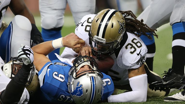Marcus Ball of New Orleans Saints sacked Matthew Stafford of Detroit Lions