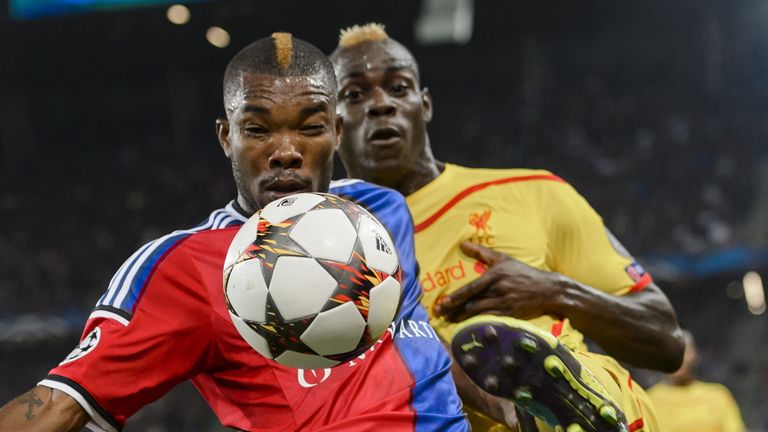An early battle of the mohawks as Mario Balotelli and Serey Die contest a loose ball