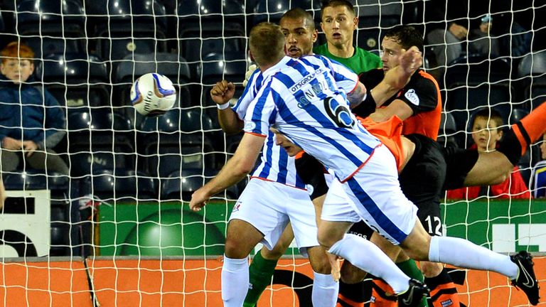 Mark Connolly heads Kilmarnock's second goal in their 2-0 victory over Dundee United at Rugby Park