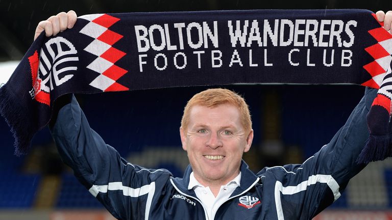 BOLTON, ENGLAND - OCTOBER 13:  Neil Lennon poses for a photographers after a press conference where he was unveiled as the new Bolton Wanderers manager at 