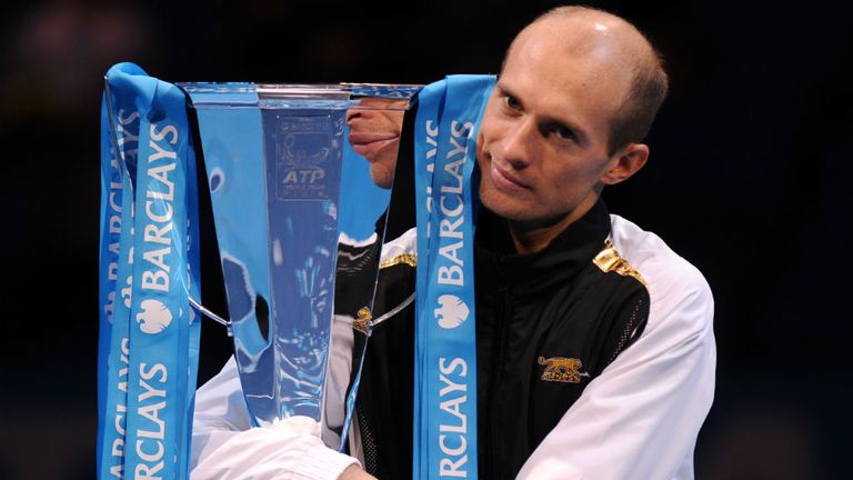 Nikolay Davydenko celebrates with the trophy at the 2009 ATP World Tour Tennis Finals in London