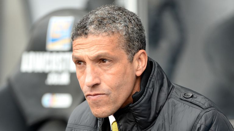 Chris Hughton, Manager of Norwich City on the bench during the Barclays Premier League match at Swansea