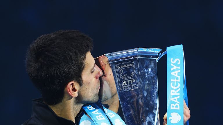 Novak Djokovic kisses the trophy last year after beating Rafael Nadal to take the ATP World Tour Finals crown for the third time