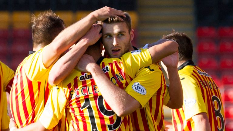 Stephen O'Donnell celebrates after scoring Partick's third goal