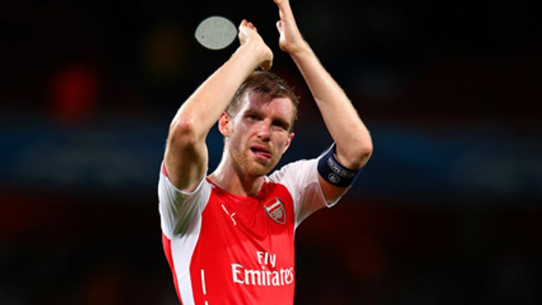 LONDON, ENGLAND - OCTOBER 01: Per Mertesacker of Arsenal applauds the fans