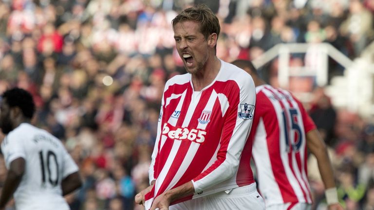 Stoke striker Peter Crouch complains about shirt-pulling