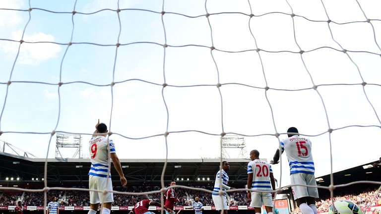 LONDON, ENGLAND - OCTOBER 05:  QPR players react after Nedum Onuoha of QPR scored an own goal during the Barclays Premier League match between West Ham Uni