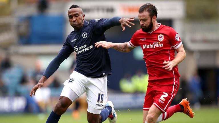 Ricardo Fuller of Millwall tackles with John Brayford of Cardiff during the Sky Bet Championship match