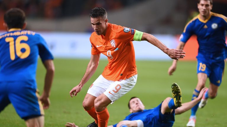 Holland's Robin van Persie runs with the ball during the Euro 2016 qualifying against Kazakhstan