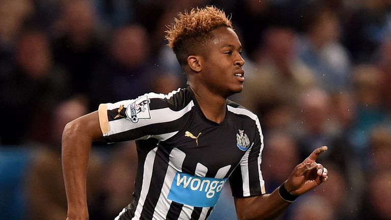 Newcastle United's Rolando Aarons (centre) celebrates scoring his sides first goal of the game during the Capital One Cup fourth round match