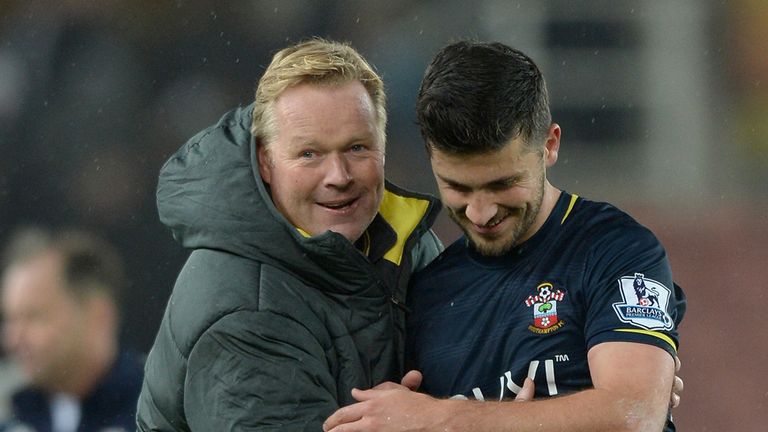 Southampton manager Ronald Koeman celebrates with Shane Long after winning the Capital One Cup Fourth Round match