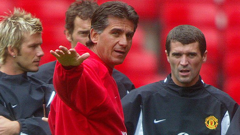 Manchester United players listen to instructions from their new first team coach Carlos Queiroz during a training session at Old Trafford, Manchester. 