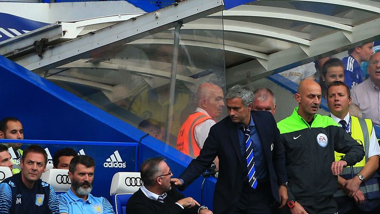 File photo dated 27-09-2014 of Chelsea manager Jose Mourinho (right) and Aston Villa manager Paul Lambert (centre) and Roy Keane (second left) looks on.
