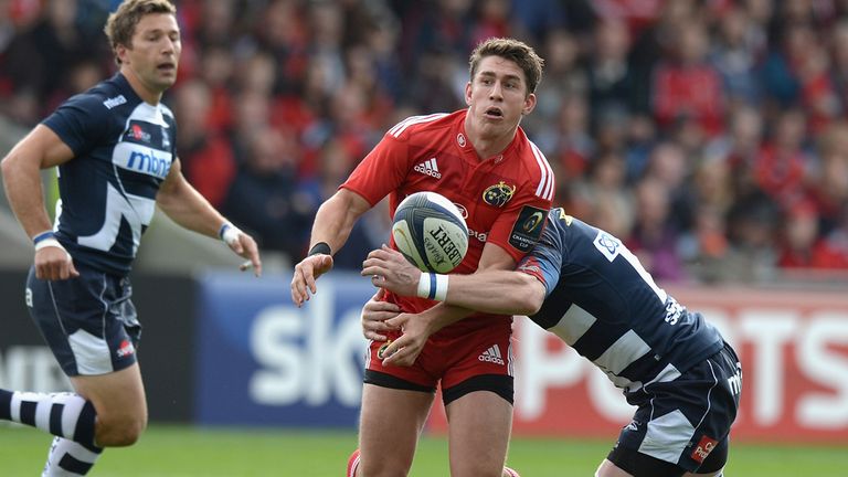 SALFORD, ENGLAND - OCTOBER 18:  Robin Copeland of Munster is tackled by Mugnus Lund of Sale during the European Rugby Champions Cup match between Sale Shar
