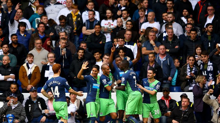 Newcastle's Sammy Ameobi celebrates with team-mates after scoring the equaliser