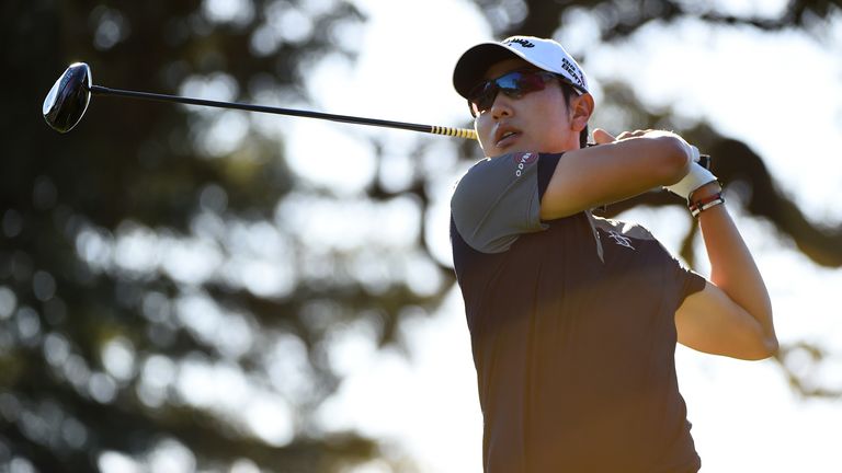 Sang-Moon Bae of South Korea hits his tee shot on the 17th hole