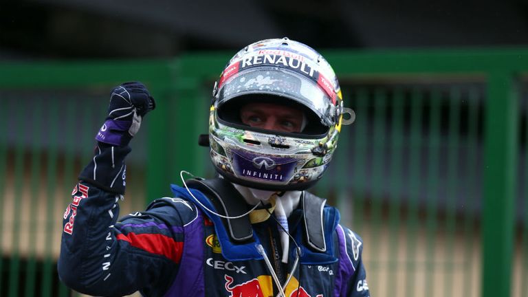 Sebastian Vettel celebrates pole