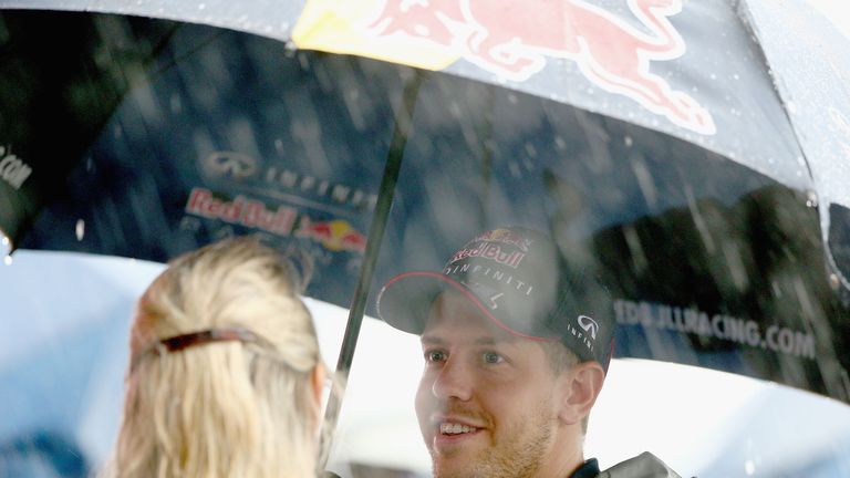 Sebastian Vettel braves the rain