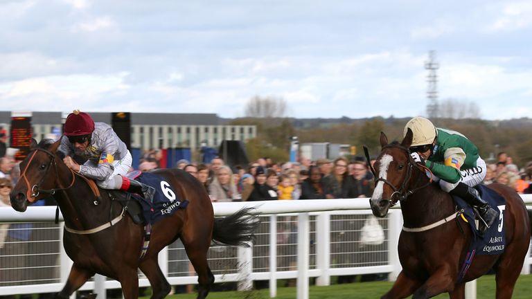 Russian Punch (right), ridden by Graham Lee, comes through to win The Al Basti Equiworld Celebration Stakes from second placed Shagah