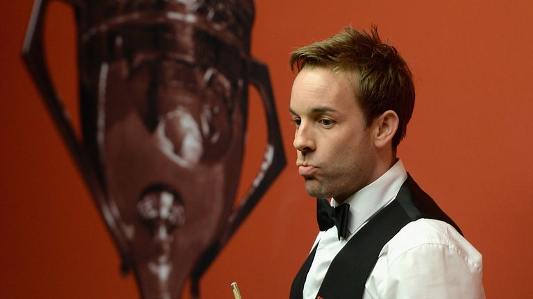 SHEFFIELD, ENGLAND - APRIL 25:  Ali Carter in action against Mark Selby during the second round of The Dafabet World Snooker Championship at Crucible Theat