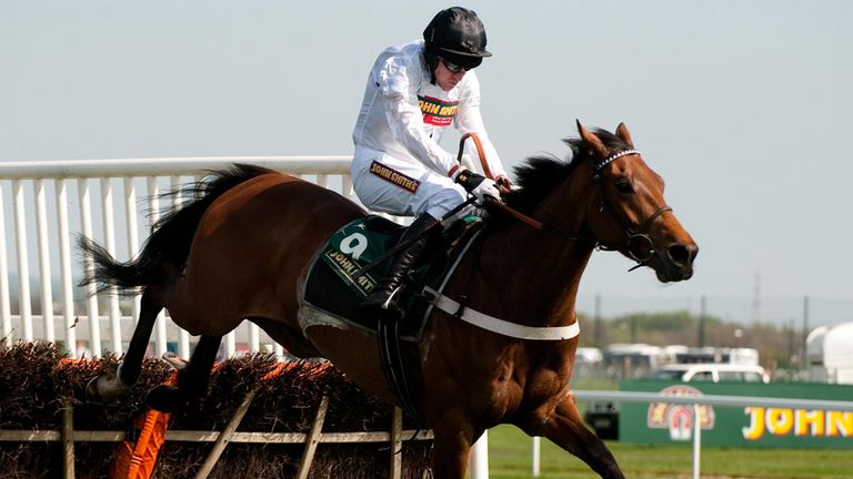 Spirit Son and Barry Geraghty jump the last on their way to winning the John Smith's Mersey Novices' Hurdle