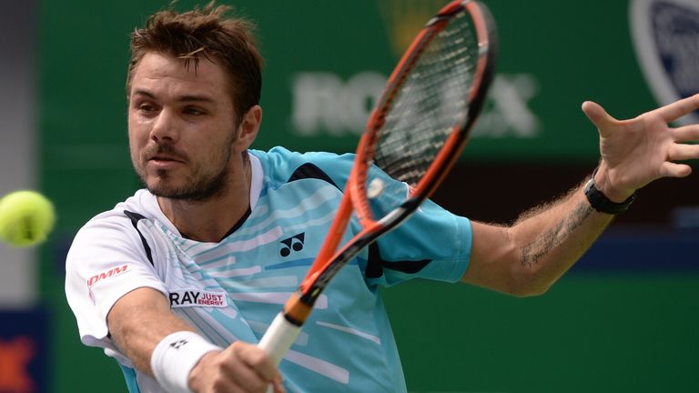 Stan Wawrinka returns a shot in his defeat to Gilles Simon in the second round of the Shanghai Masters
