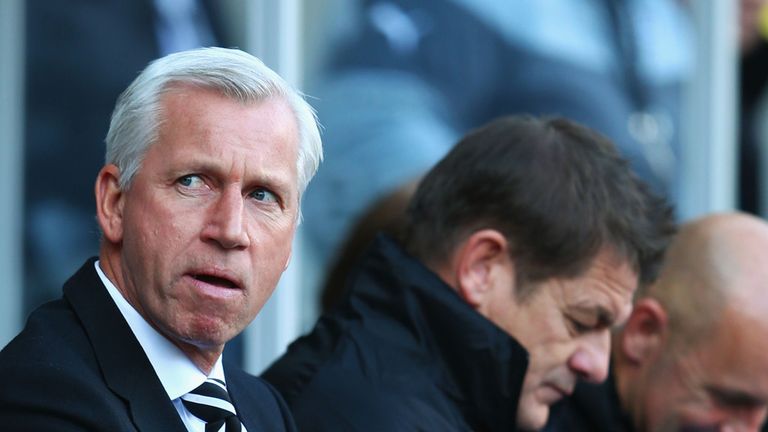 Alan Pardew looks on from the bench against Swansea