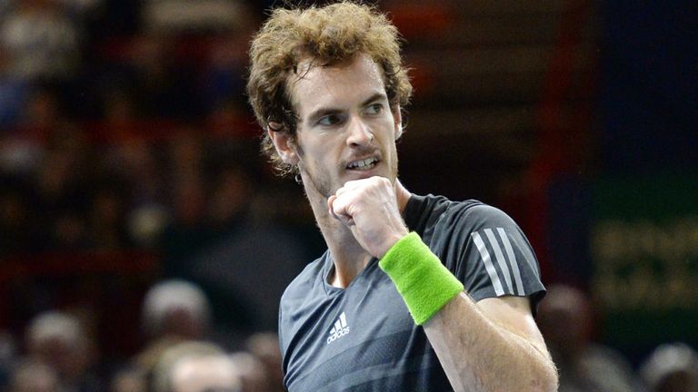 Andy Murray returns the ball to Julien Benneteau during the second-round match of the ATP Paris Masters