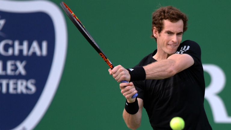 Andy Murray hits a return against Jerzy Janowicz during their second round match at the 2014 Shanghai Masters 