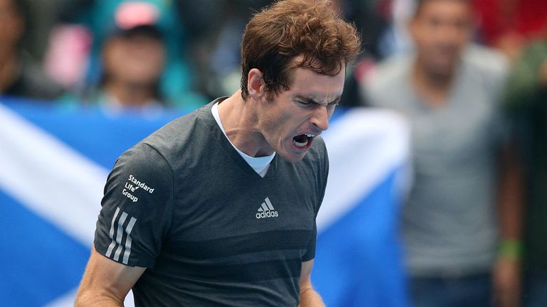 Andy Murray celebrates winning his match against Marin Cilic at the 2014 China Open 