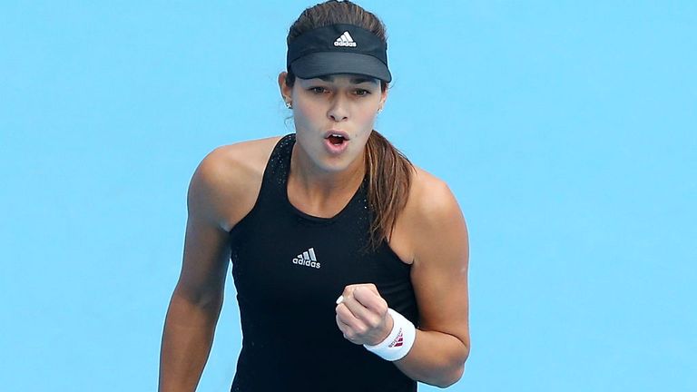 Ana Ivanovic celebrates winning a point in her match against Sabine Lisicki  at the 2014 China Open