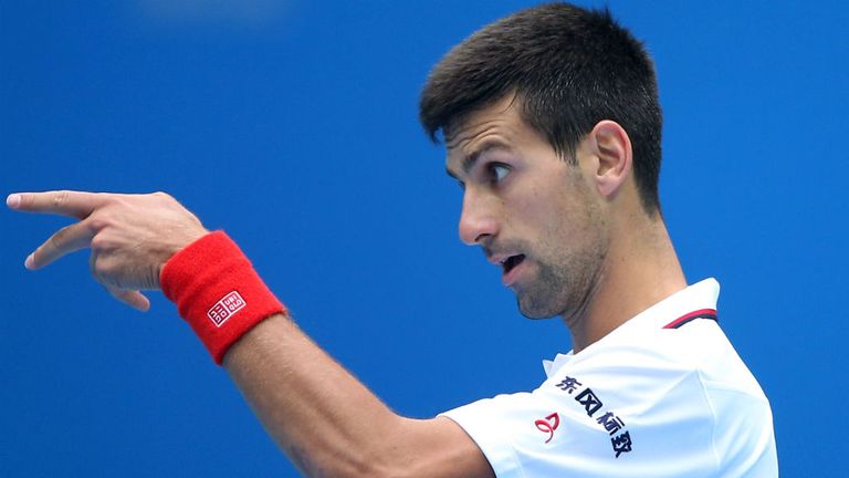 Novak Djokovic reacts during his match against Grigor Dimitrov at the 2014 China Open
