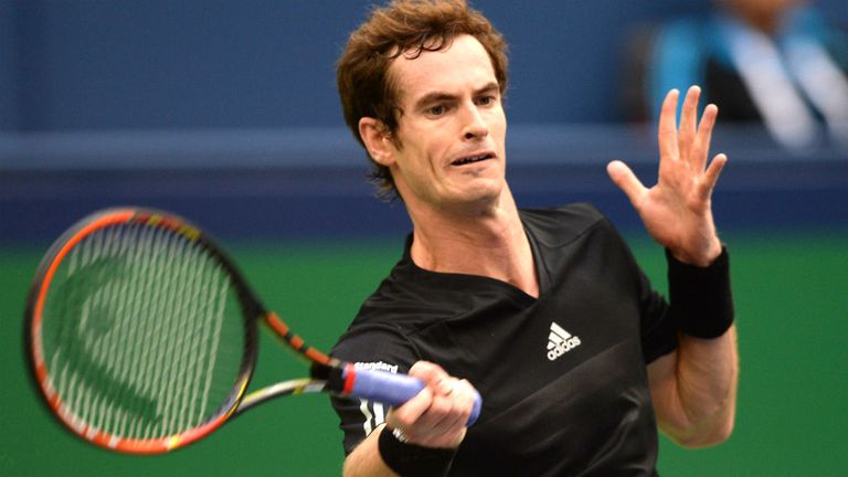 Andy Murray hits a return against David Ferrer during their match at the 2014 Shanghai Masters