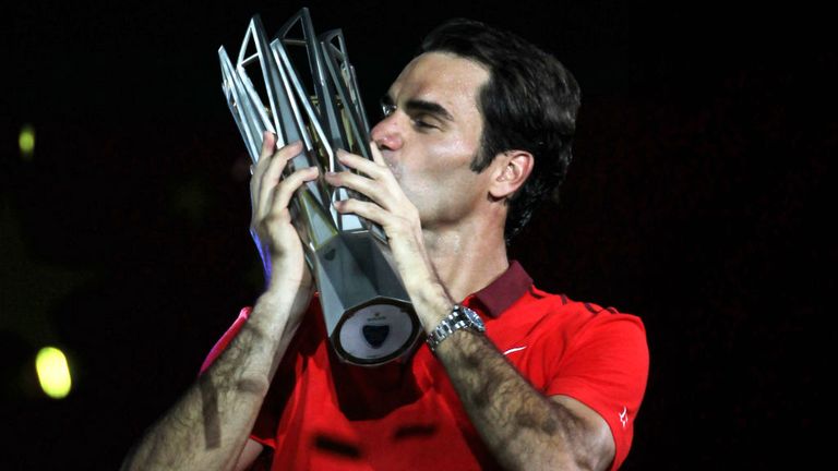 Roger Federer celebrates after winning the final against Gilles Simon during the 2014 Shanghai Rolex Masters 