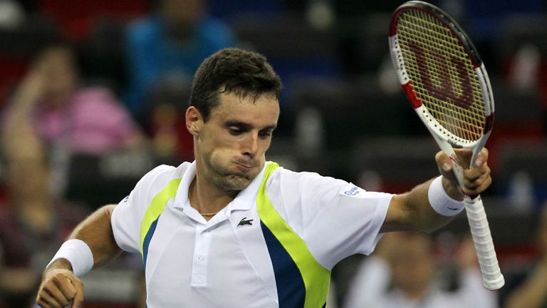 Roberto Bautista Agut reacts after winning his match against Alexandr Dogopolov during the 2014 Shanghai Rolex Masters