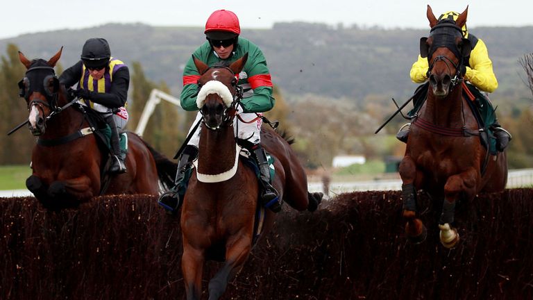 Eventual winner The Romford Pele (left) jumps with Highland Retreat (centre) and Lamb of Cod (right)