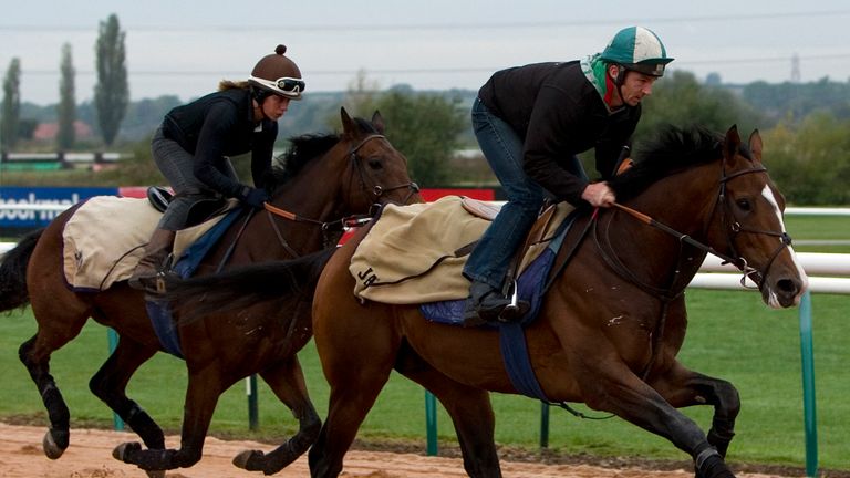 Toast of New York (right) is exercised by former jump jockey Jimmy McCarthy