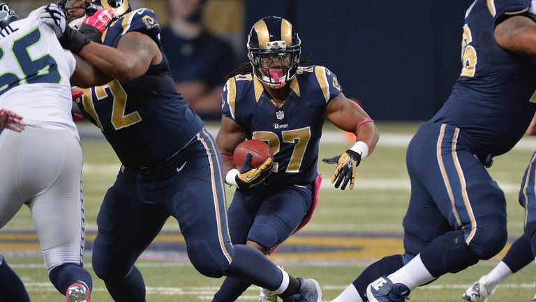 Tre Mason #27 of the St. Louis Rams rushes against the Seattle Seahawks