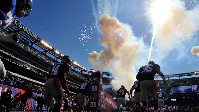 The New York Giants run onto the field prior to their week five clash with the Atlanta Falcons at MetLife Stadium, New York
