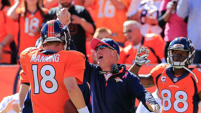 Quarterback Peyton Manning of the Denver Broncos celebrates his 500th career touchdown pass 