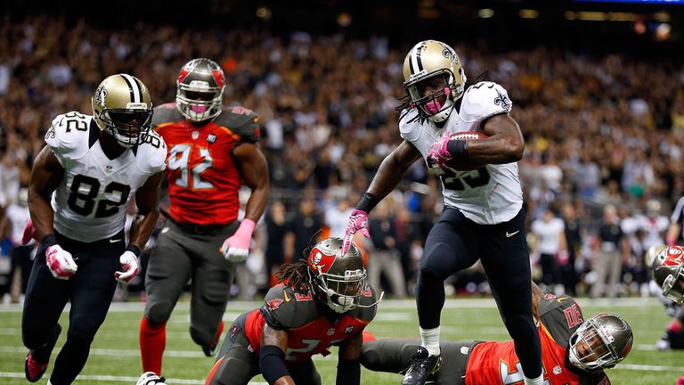 Khiry Robinson of the New Orleans Saints rushes for a touchdown in overtime against the Tampa Bay Buccaneers
