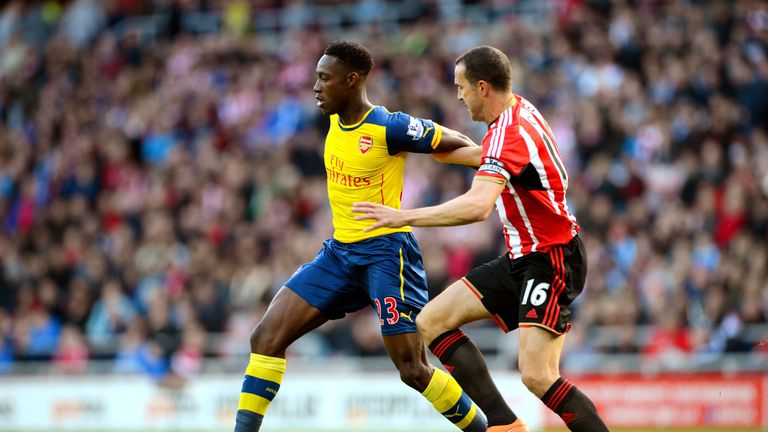 Danny Welbeck holds off John O'Shea as Arsenal look for an early breakthrough
