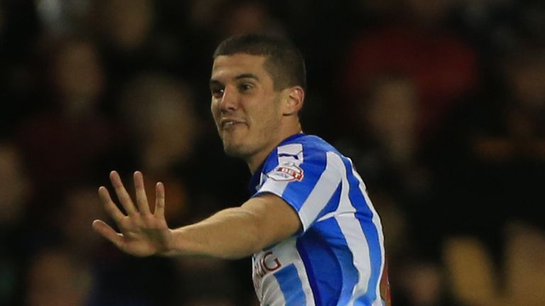 Huddersfield Town's Conor Coady celebrates scoring the third goal against Wolverhampton Wanderers, during the Sky Bet Championship match at the Molineux
